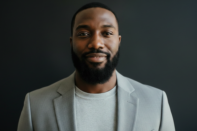 Hero slide – landscape portrait, Black man with beard, dark background